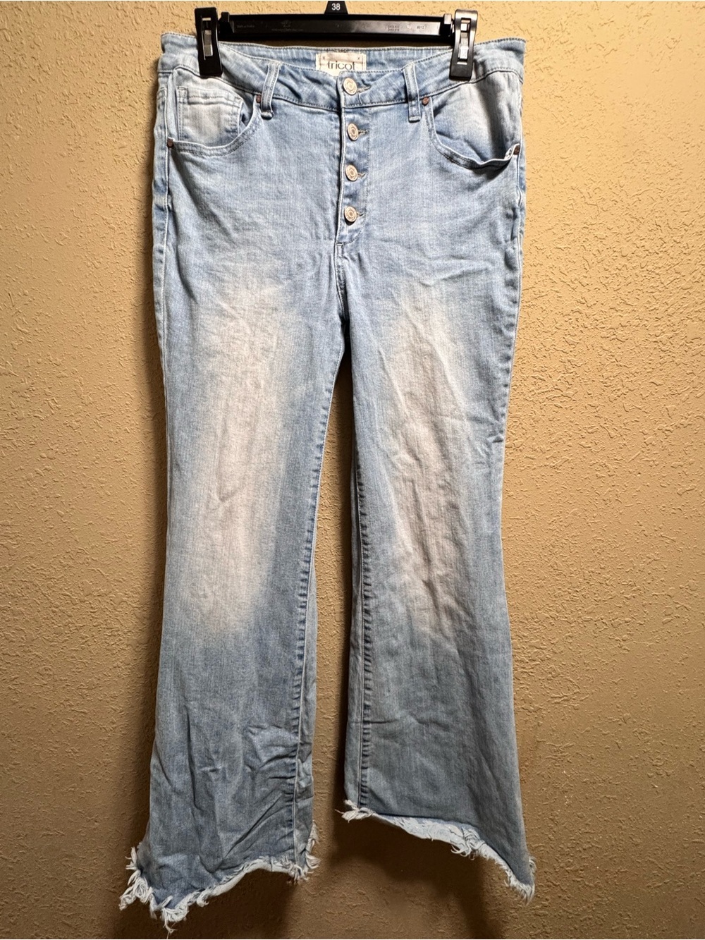High-Rise Light Blue Skinny Jeans with Frayed Hem
